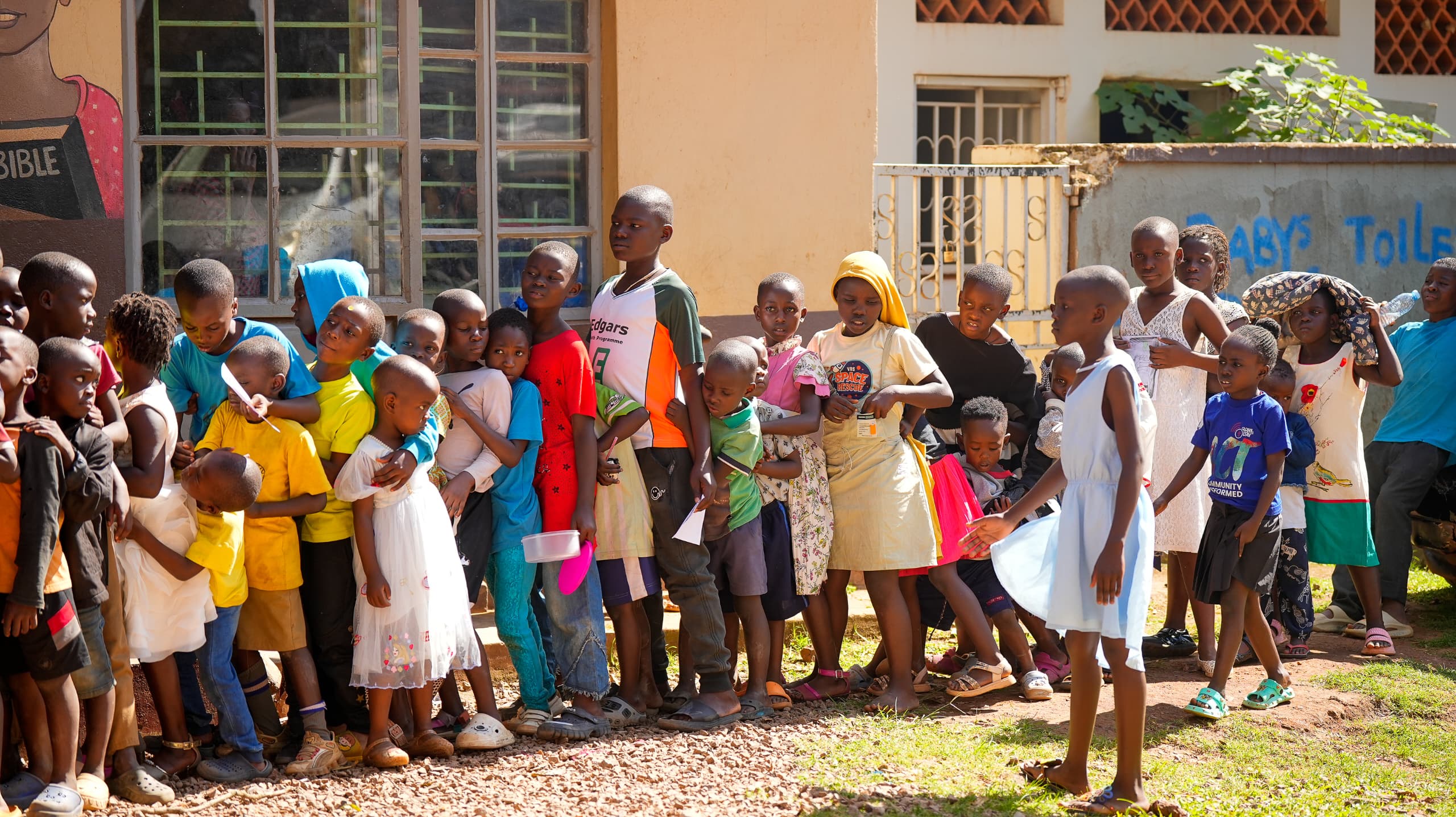Children gathered outside the centre